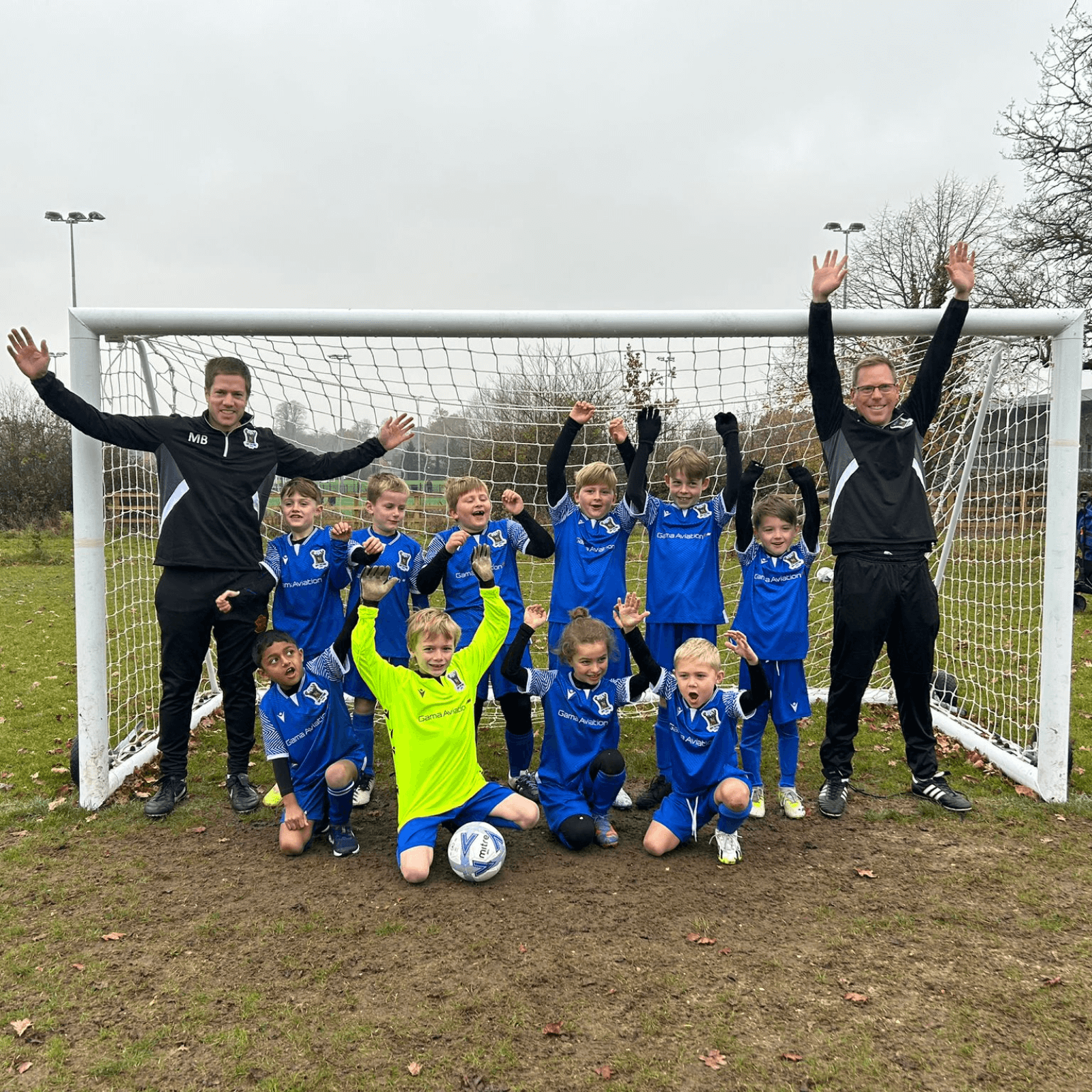 Group photo at goal post