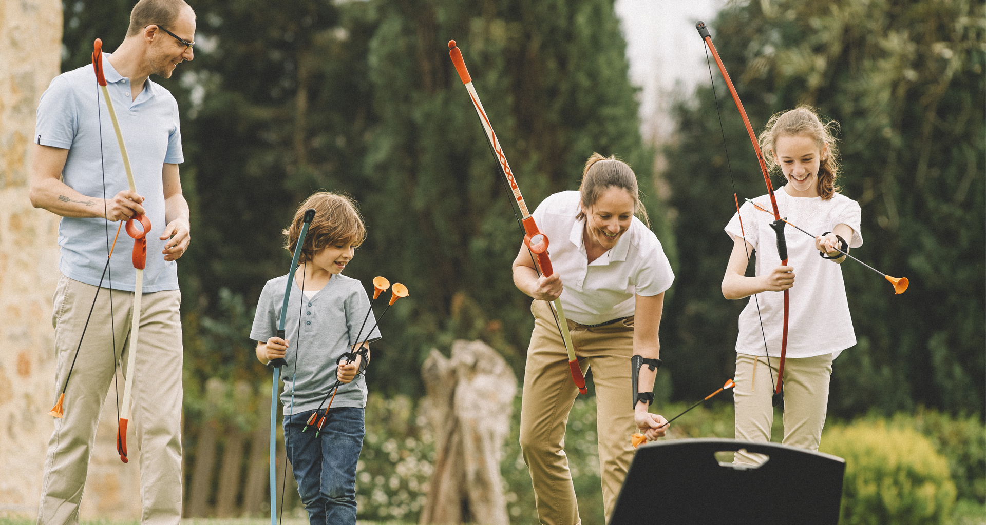 family playing archery