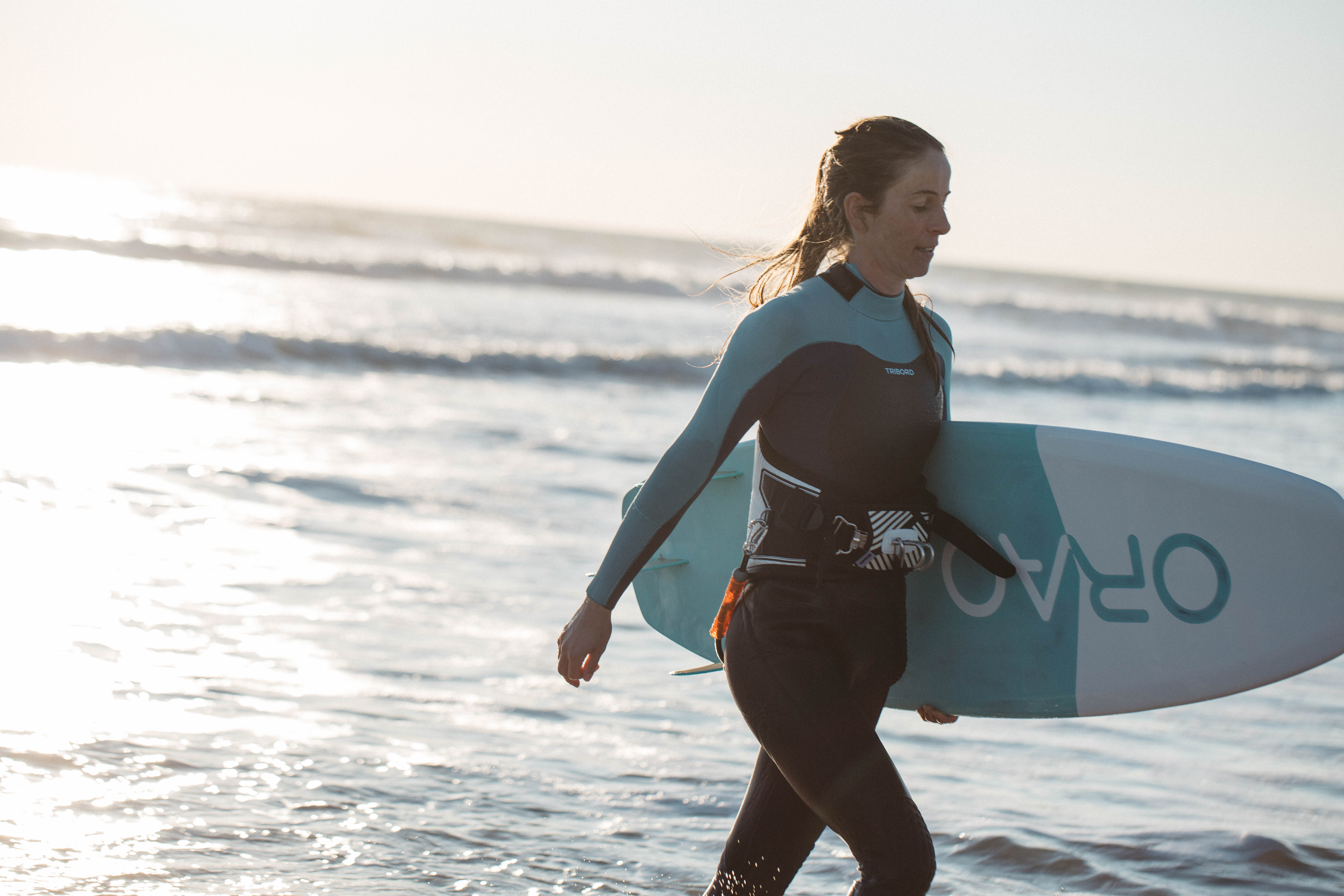 Woman with surfboard