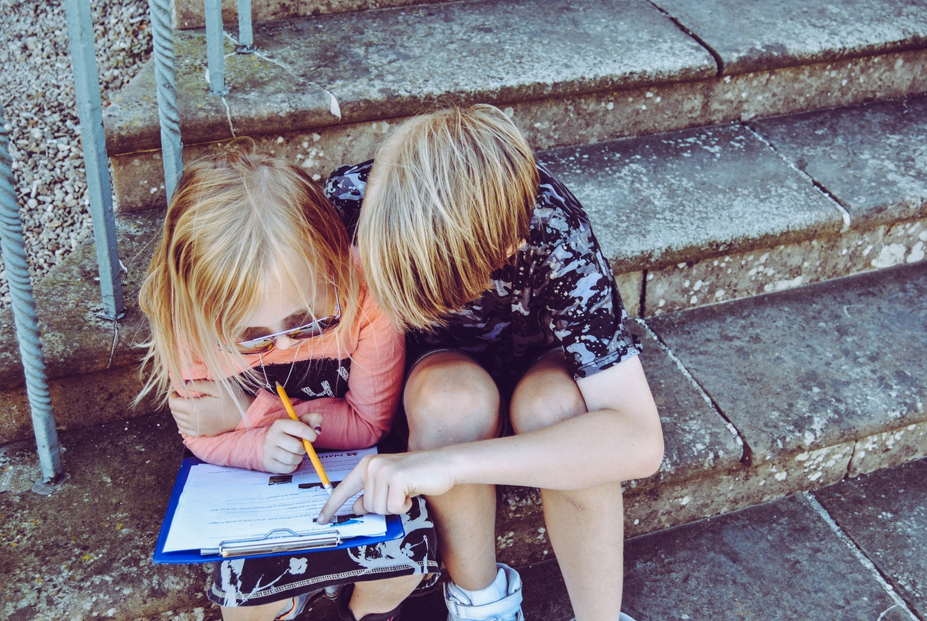 Children with a clipboard